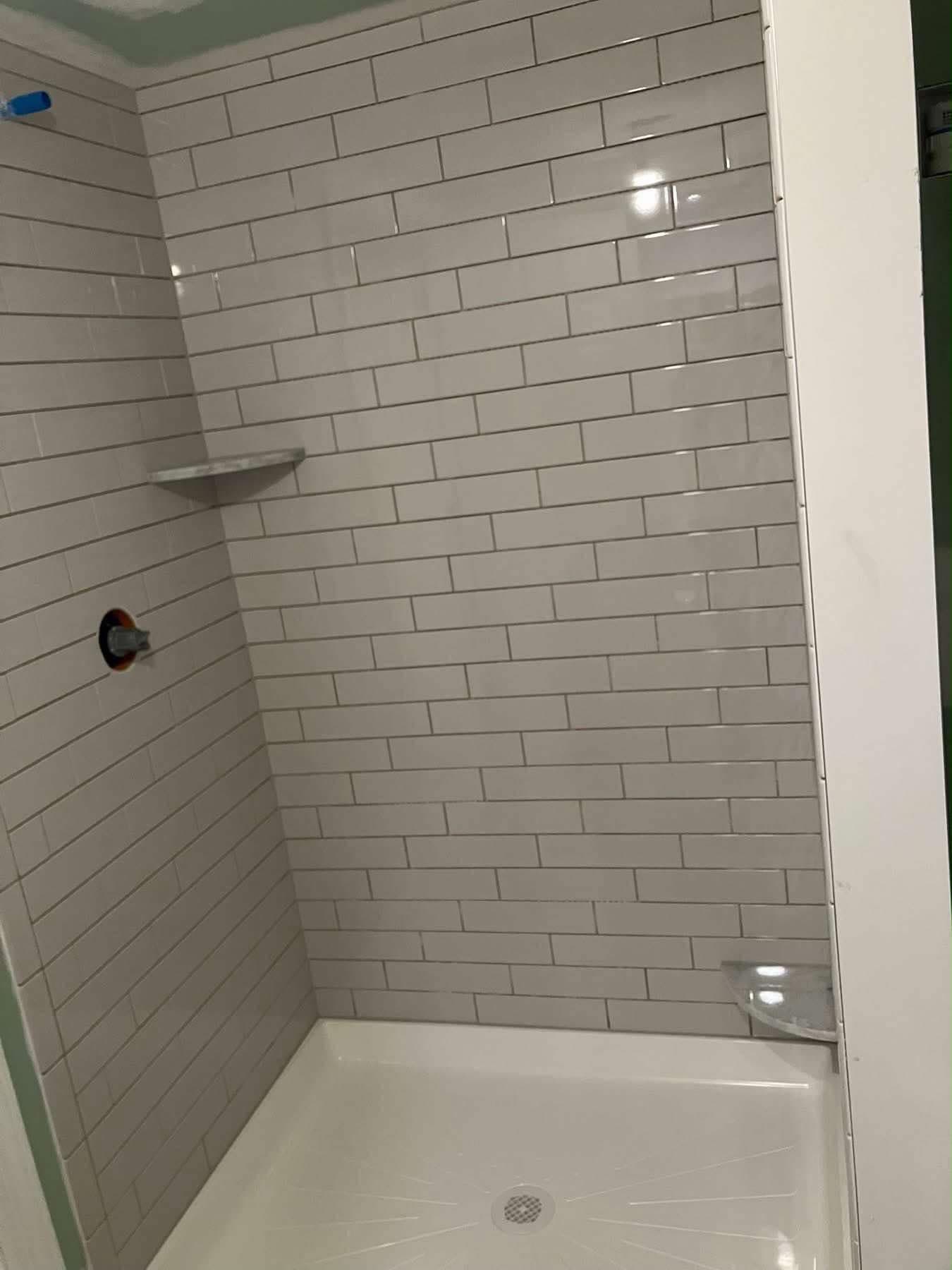 Herringbone Floor Tile & Subway Shower Combo